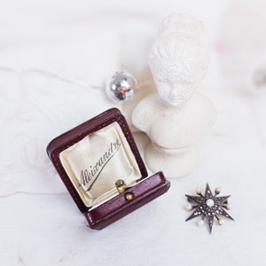Antique small tooled leather jewelry box