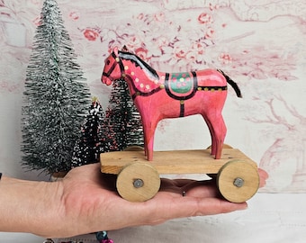 Antique toy horse on wheels, Germany 1920s