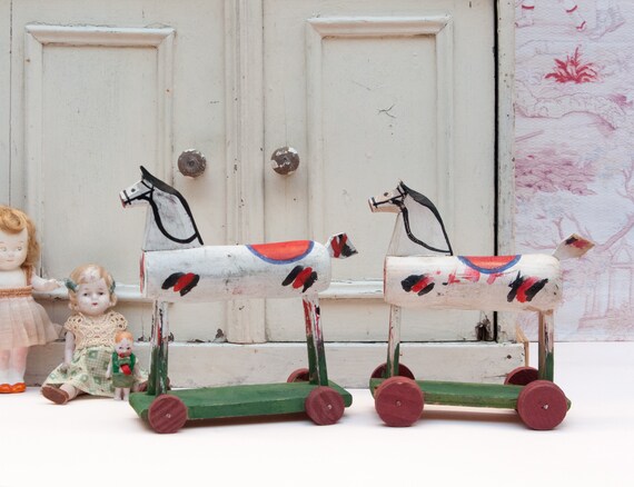 antique wooden horse on wheels