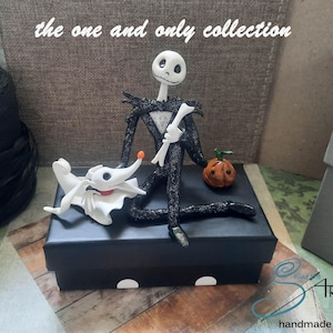 JACK SKELLINGTON y ZERO hechos a mano en arcilla polimérica cartsobre caja de cartón