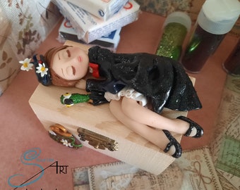 sleeping MARY POPPINS handmade in polymer clay without molds on a wooden box