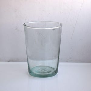 May include: A rustic wooden sign with the text "Welcome to our home" in white lettering. The sign features a distressed finish and a simple, inviting design, perfect for a front porch or entryway.