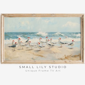 Puede incluir: Una pintura que representa una escena de playa con gaviotas que llevan gorros de Papá Noel. Las gaviotas están de pie en la playa de arena con el océano de fondo. El cielo es azul y hay nubes blancas.