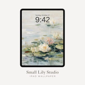 May include: An iPad displaying a digital painting of water lilies in a pond. The artwork features soft pastel colors, with white and pink flowers and green lily pads. The time is 9:42 AM on Sunday, October 17. The text "Small Lily Studio" and "iPad Wallpaper" are at the bottom.