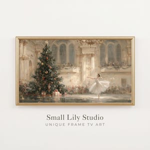 May include: A rectangular gold-framed digital artwork depicting a ballerina in a white tutu dancing in a grand hall with a large decorated Christmas tree. Below the frame, the text reads Small Lily Studio UNIQUE FRAME TV ART.