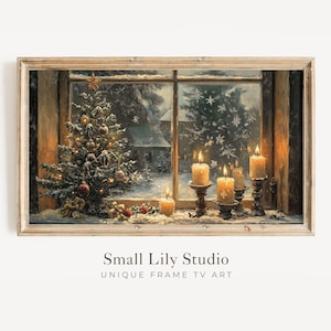 May include: A framed print depicting a winter scene with a Christmas tree and lit candles on a windowsill. The tree is adorned with decorations and a star. The window offers a view of a snowy landscape. The text "Small Lily Studio UNIQUE FRAME TV ART" is at the bottom.
