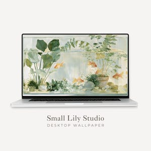 May include: A laptop displays a desktop wallpaper featuring an aquatic scene. The wallpaper showcases goldfish swimming amongst aquatic plants and a small potted plant. The text "Small Lily Studio DESKTOP WALLPAPER" is displayed below the laptop screen.