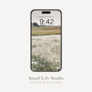 May include: A smartphone screen shows a tranquil landscape wallpaper with a field of white flowers beneath a pale sky. The time, 9:42, and date, Sunday, October 17, are displayed at the top. The text "Small Lily Studio PHONE WALLPAPER" is at the bottom.