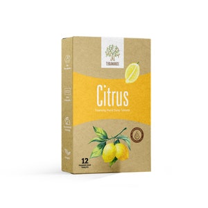 May include: A box of 12 citrus-scented foaming hand soap tablets. The box is made of brown cardboard and features a watercolor illustration of lemons and a green leaf. The text "Citrus Foaming Hand Soap Tablets" is printed on the front of the box.