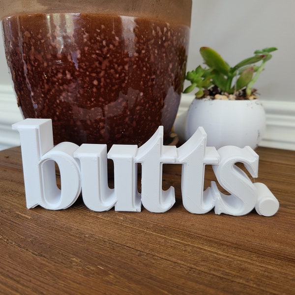 butts typographic art decor piece funny goofy sculpture