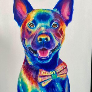 May include: A colorful painting of a dog wearing a bow tie. The dog is painted in shades of blue, purple, green, yellow, and orange. The bow tie is yellow, green, and orange.