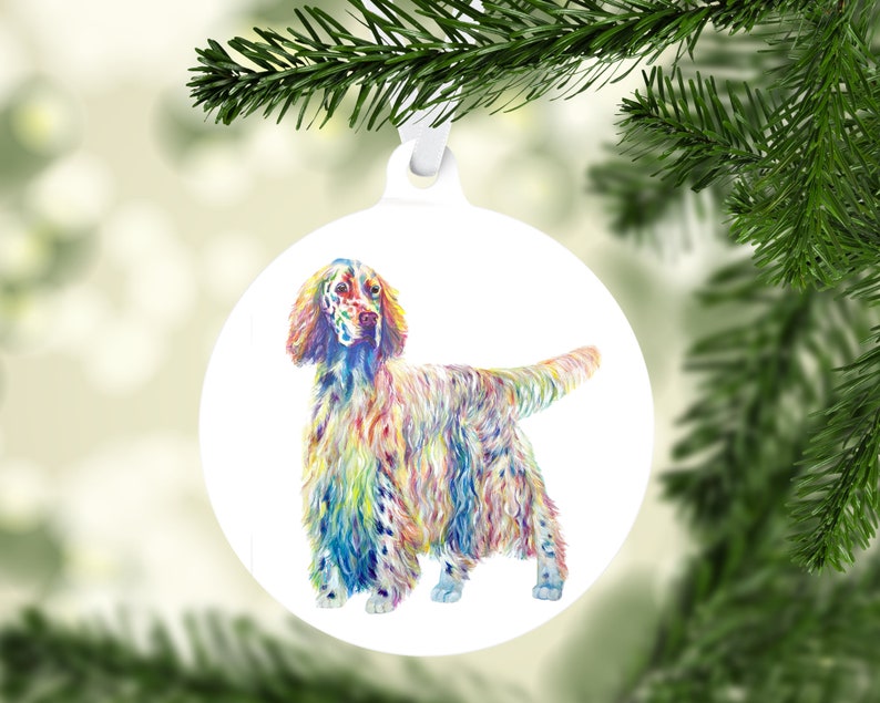 May include: A colorful, abstract painting of an Irish Setter dog on a white round ornament. The dog is standing with its head turned to the side and its tail curled.