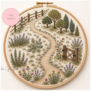 May include: Embroidered landscape scene in a wooden hoop. A winding path leads through a field with trees, flowers, and a wooden fence. The text "PDF Pattern" is in a pink circle. The embroidery is in shades of green, beige, and purple.