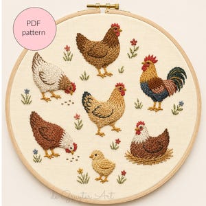 May include: Embroidered hoop art featuring a collection of chickens and a rooster in various poses, surrounded by small flowers and grass. The text "PDF pattern" is in a pink circle. The artwork is on a cream-colored fabric.