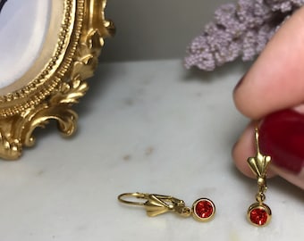 Pendientes de cristal rojo bañados en oro estilo Art Déco