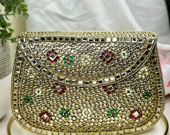 Gold Kundan metal Bag with multi Stone Embellishments - Perfect for Weddings and Formal Events