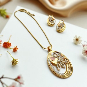 Elegant Gold-Plated Pendant Necklace and Earring Set with Diamonds and Pink Stone