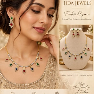 May include: A gold-toned necklace and earring set featuring teardrop-shaped gemstones in red, green, and blue. The necklace has a chain with alternating metallic segments and dangling pendants. The earrings match the necklace design with teardrop stones.