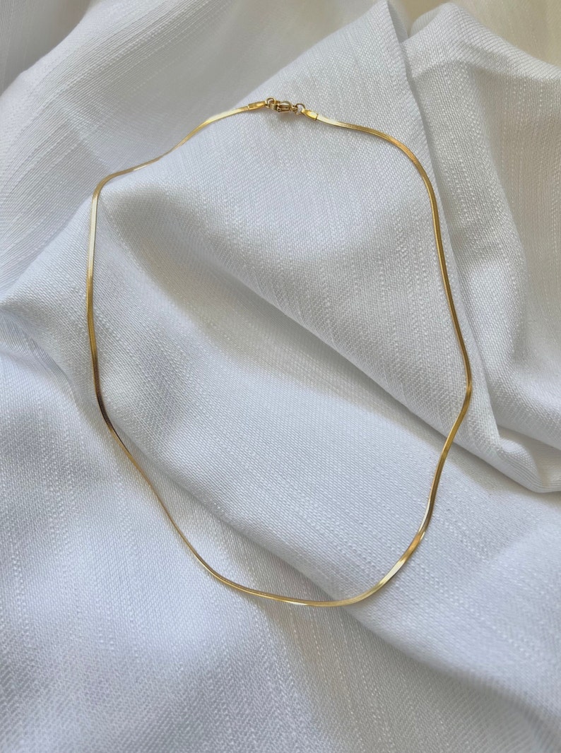 Gold 1.2mm herringbone necklace