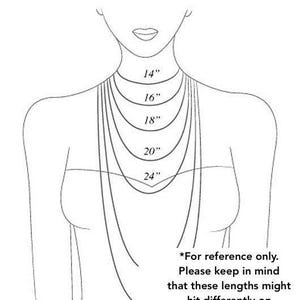 May include: A line drawing of a person's neck and shoulders with different necklace lengths marked in inches. The lengths are 14 inches, 16 inches, 18 inches, 20 inches, and 24 inches. The text below the drawing says "For reference only. Please keep in mind that these lengths might hit differently on different bodies."