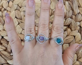 Steel rings with amethyst stones, moon pearl and green agate.