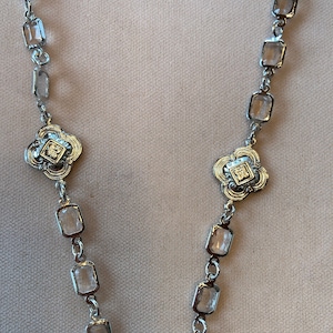 Clover Shield and crystal stones necklace from the Unchained jewelry.