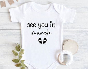See you in March baby onesie®, Pregnancy announcement Onesie®, Baby reveal onesie, Baby announcement