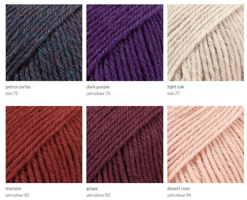 May include: Yarn samples in various colors, including petrol cerise, dark purple, light oak, maroon, grape, and desert rose. The yarn is arranged in a grid pattern.
