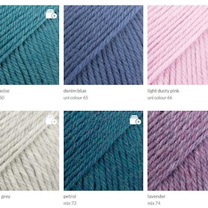 May include: Yarn samples in ten colors: blue turquoise, denim blue, light dusty pink, light pearl grey, petrol, lavender, dark grey, dark blue, light blue, and pink. The yarn is arranged in two rows of five samples each.