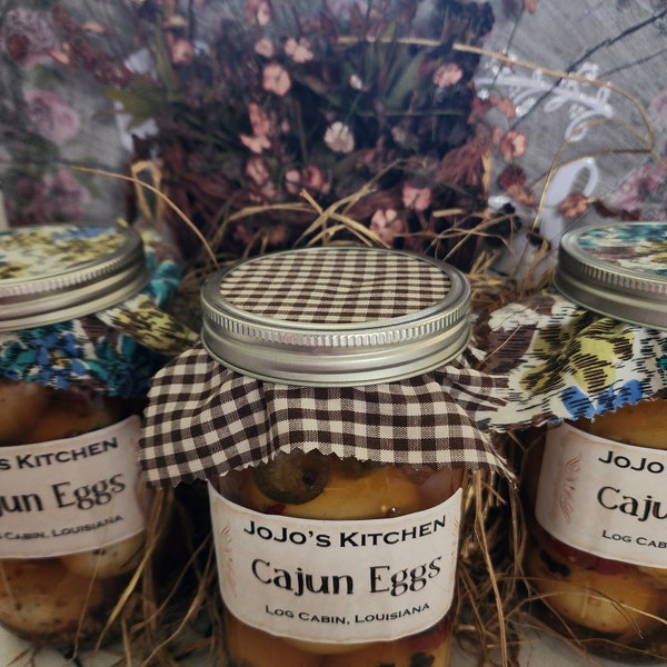 Pickled eggs, Cajun flavored, spicy eggs in crab boil, eggs, fresh made to order, snack food condiments, pickled food item bar foods