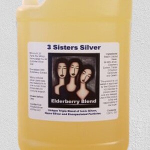 May include: A clear plastic jug with a yellow liquid inside. The label reads "3 Sisters Silver Elderberry Blend" with a drawing of three women. The label also states "Unique Triple Blend of Tonic Silver, Nano Silver and Encapsulated Particles."