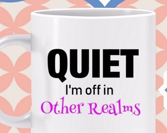 QUIET I'm Off in Other Realms mug -pink A mug that is a HUSH UP sign for anybody noisy. Just wave your cup or point at it to turn sound off