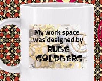 My Work Space was Designed by Rube Goldberg Mug - innovation humor, creativity emerges from chaos, avoid linear thinking, indirect solutions