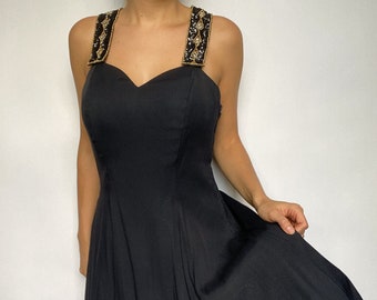 80s vintage black formal dress with gold sequin straps and sweetheart neckline fit and flare skater fit