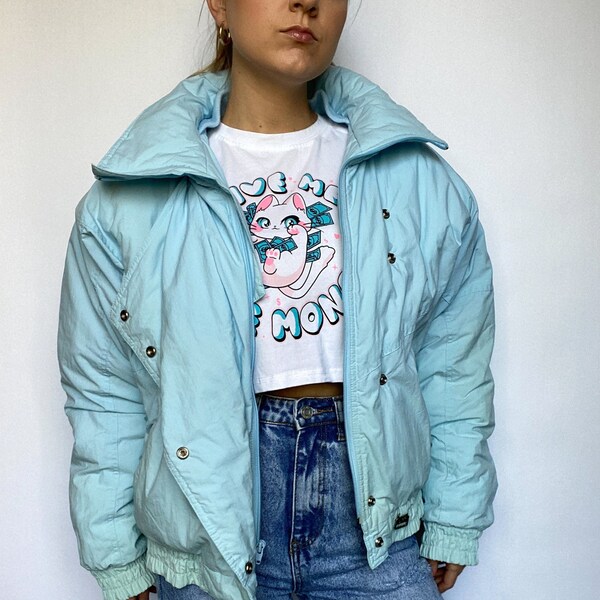 80s vintage pastel light blue puffer ski jacket with moto style flap and silver snap detail