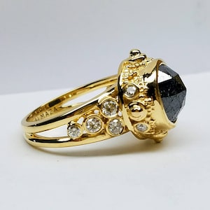 Unique one of a kind Black diamond engagement ring.