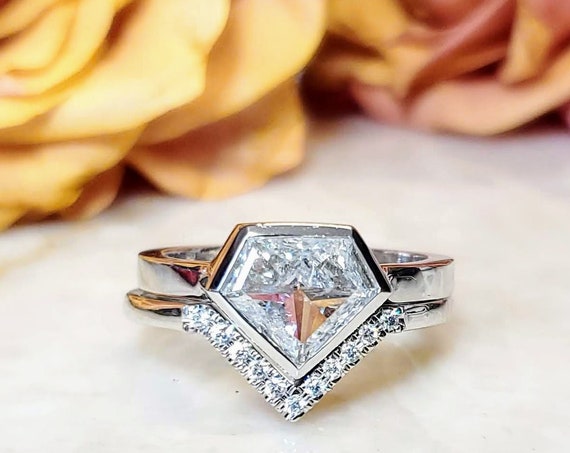 Shield shape diamond 1.35 carat engagement ring