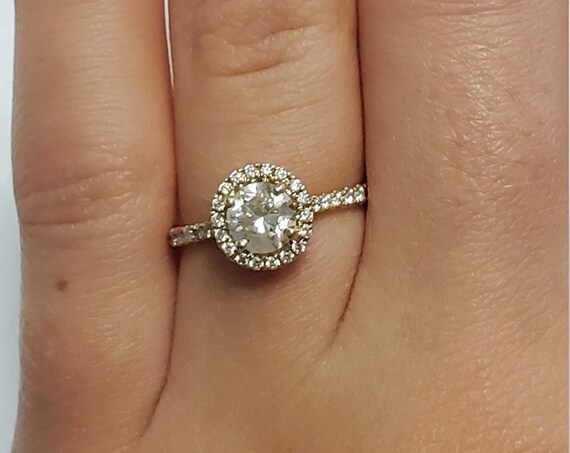 14kt Yellow gold halo diamond engagement ring.