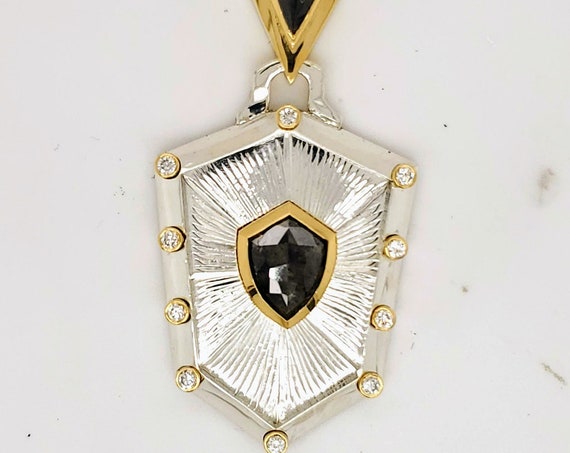 Shield Pendant in Silver and 18kt Gold with Black and White Diamonds.