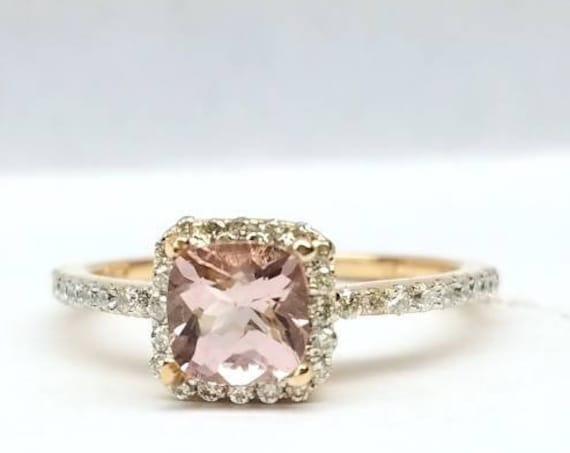 Morganite engagement ring with halo set in 14k rose gold.