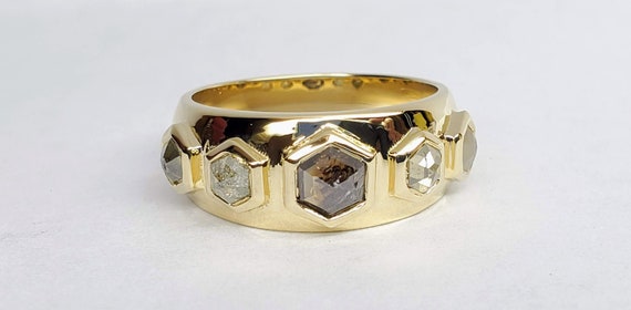Hexagon multi color diamond yellow gold band.