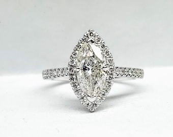 1.40 carat marquise white gold engagement ring.