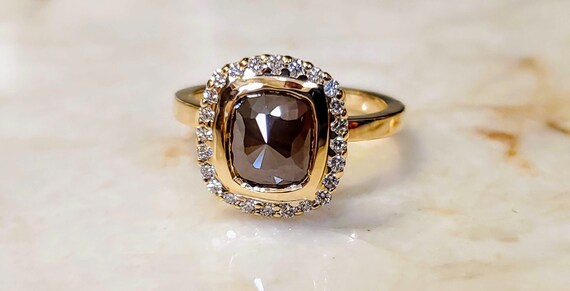 14kt yellow gold Champagne color cushion cut diamond engagement ring.