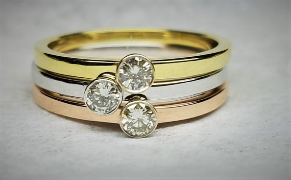 Dainty Diamond engagement ring.