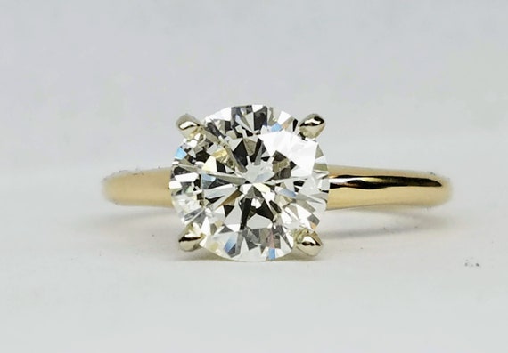 Solitaire diamond engagement ring. 1.34 carat diamond engagement ring.