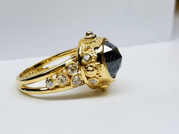 Unique one of a kind Black diamond engagement ring.