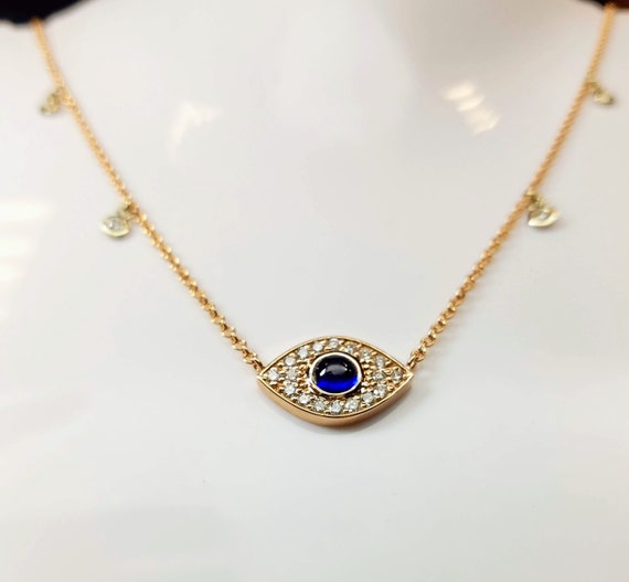 Evil eye necklace, 14kt gold and diamond Evil eye pendant.