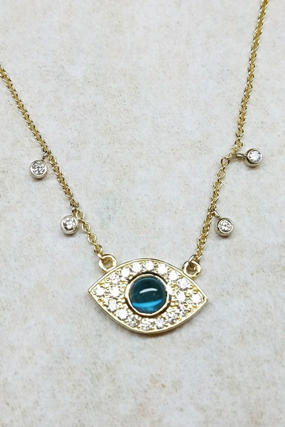 Blue evil eye diamond necklace.