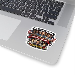 May include: A sticker with the text "Nurses Stand United" and "Justice for Alex Pretti." The design includes images of nurses, American flags, candles, and flowers. The sticker is on a laptop.