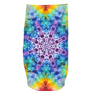 May include: A rectangular fabric piece featuring a vibrant tie-dye pattern. The design showcases a central purple and white starburst mandala motif surrounded by swirling shades of blue, turquoise, yellow, and red, creating a kaleidoscopic effect.